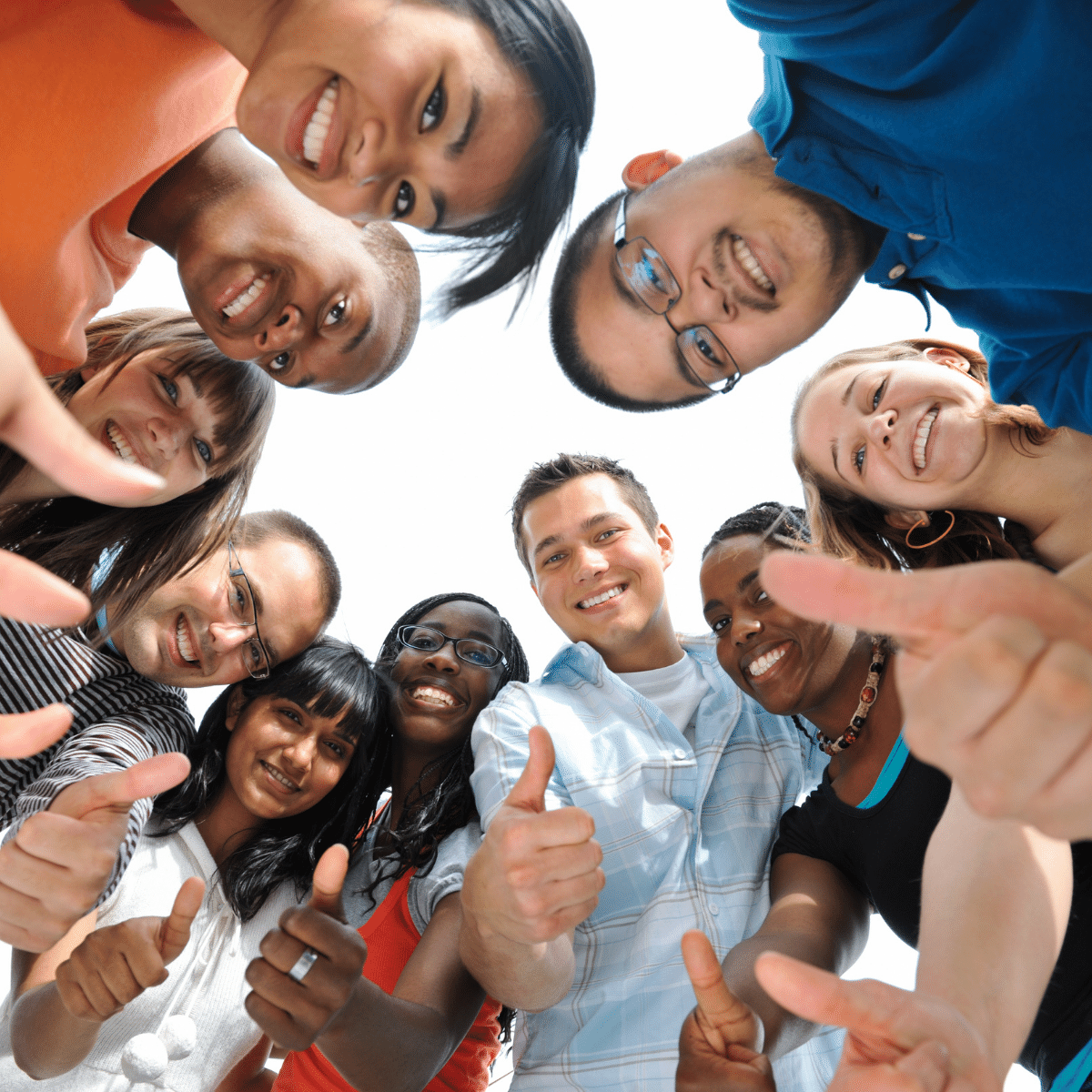 Adults in a circle giving the thumbs up